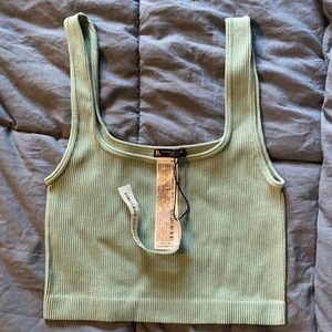 Medium cropped tops. Get both pink and teal tops